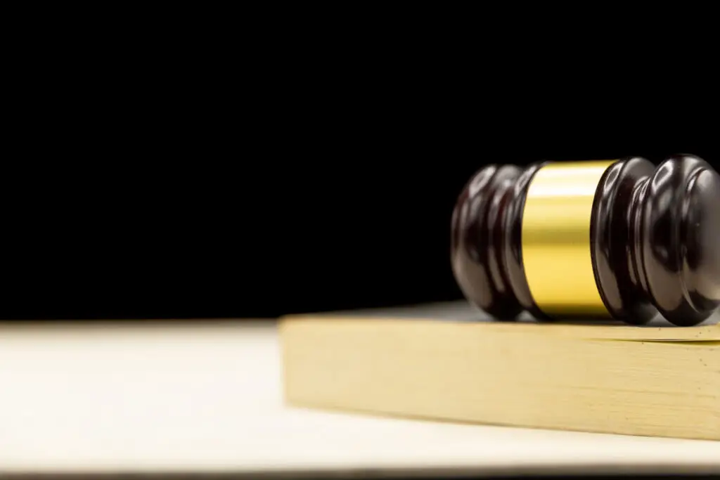 judges-gavel-book-wooden-table-law-justice-concept-background